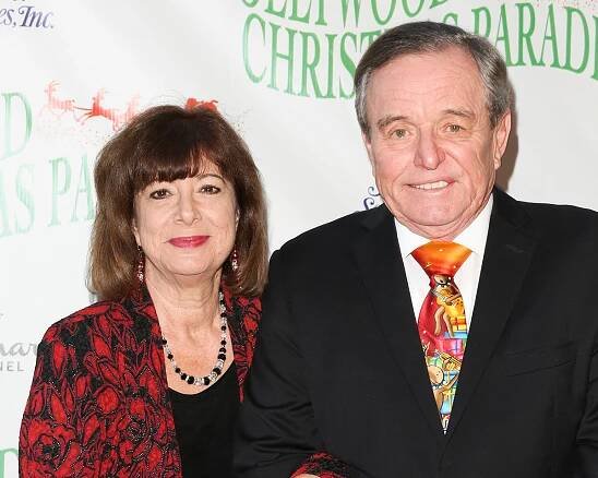 Actor Jerry Mathers (R) and his Wife Teresa Modnick (L) attend the 87th Annual Hollywood Christmas Parade on November 25, 2018
