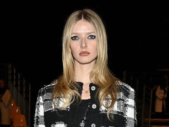 Apple Martin channels mom Gwyneth Paltrow in a candy stripe bikini