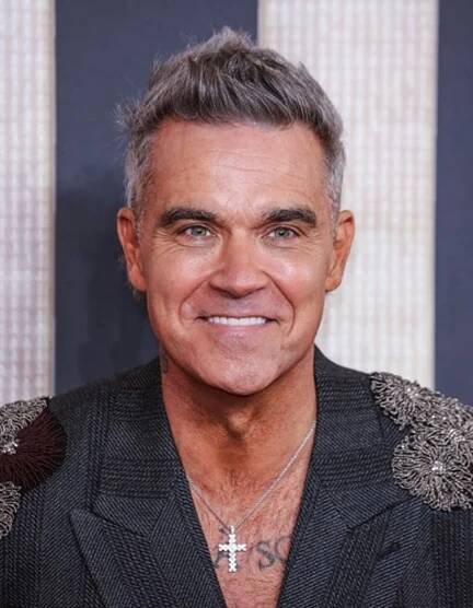 Zpěvák Robbie Williams na premiéře filmu Better Man