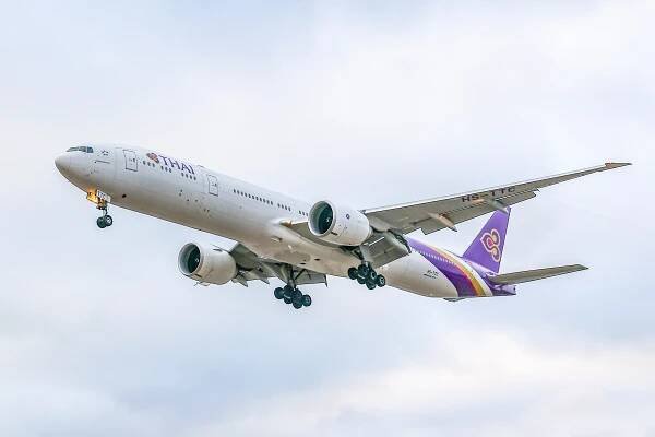 Thai Airways Boeing 777-300ER on final approach to Heathrow Airport.