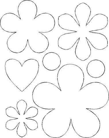 paper flowers and hearts cut out on a piece of paper