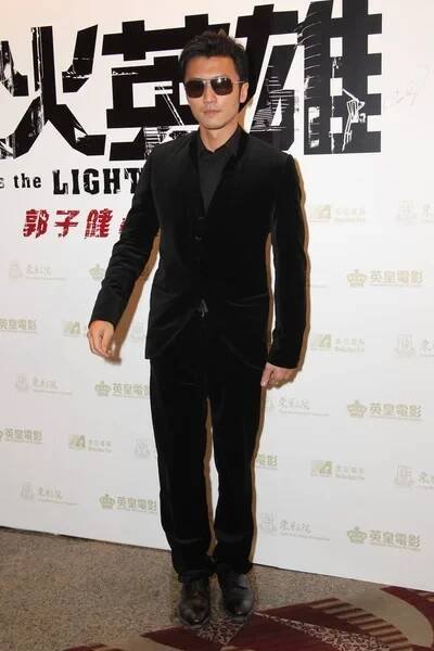 Hongkong zpěvák a herec Nicholas Tse představuje během premiéry pro jeho nový film, jako The světlo jde ven, Hong Kong, Čína, 19. prosince 2013. — Stock obrázek