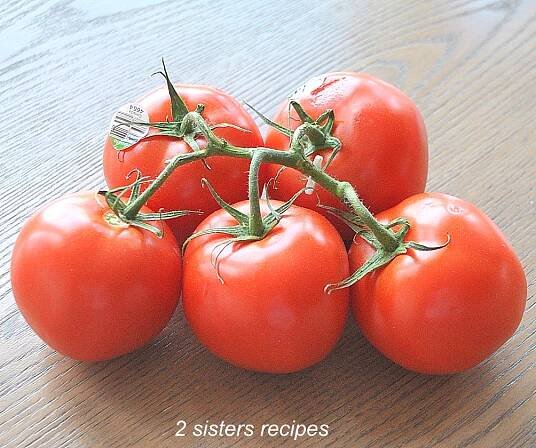 Fresh tomatoes on the vine by 2sistersrecipes.com