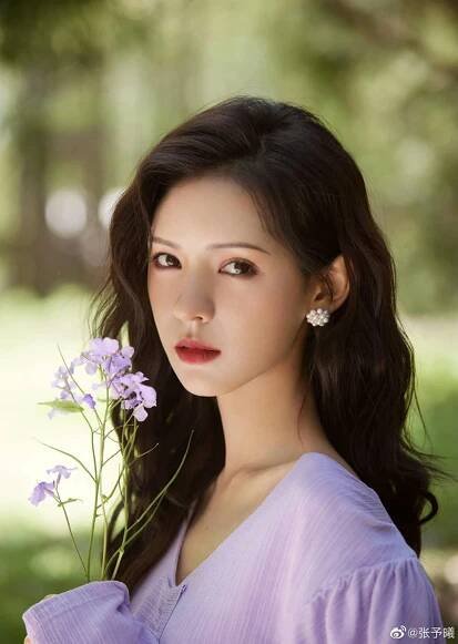 Zhang Yuxi prettier than AIportrait' 'woman' 'flowers' 'purple.