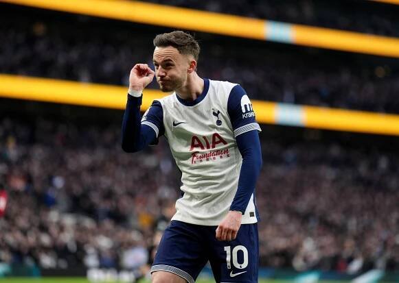 James Maddison of Tottenham Hotspur celebrating a goal.