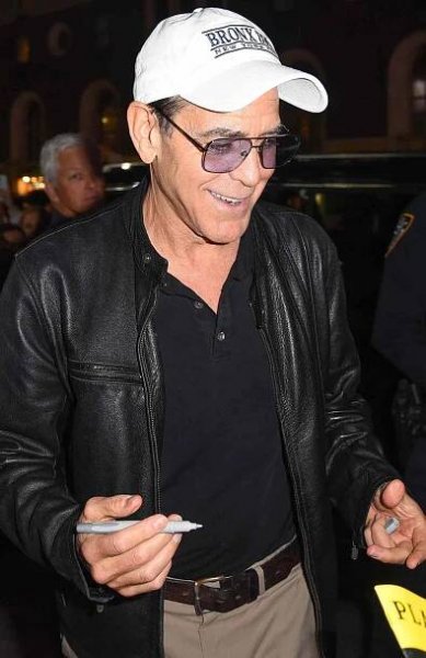 George Clooney greets his fans on his 64th birthday as he departs his Broadway show "Good Night, and Good Luck"