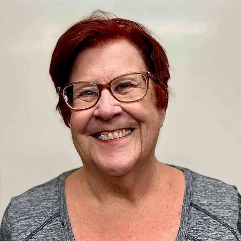 Mary Skinner, a patient of Live Life Physiotherapy, smiles at the camera