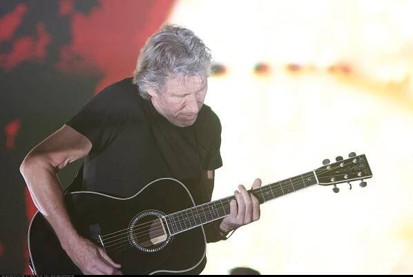 Roger Waters Rocks the Stage with His Guitar