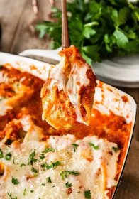 Chicken Parmesan Stuffed Shells are flavorful, cheesy, and wonderfully filling. They're a family favorite dinner that's easy to make!