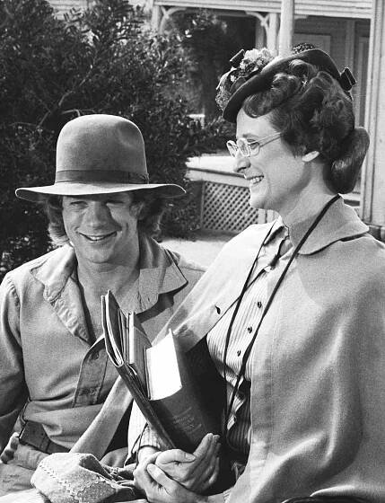 LITTLE HOUSE ON THE PRAIRIE -- "Back to School: Part 1 and 2" Episode 1 and 2 -- Aired 9/17/79 and 9/24/79 -- Pictured: (l-r) Dean Butler as Almanzo James Wilder, Lucy Lee Flippin as Eliza Jane Wilder 