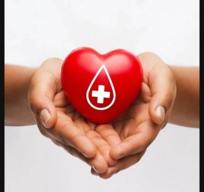 Ženské ruce červené srdce s dárcem znamení — Stock fotografie