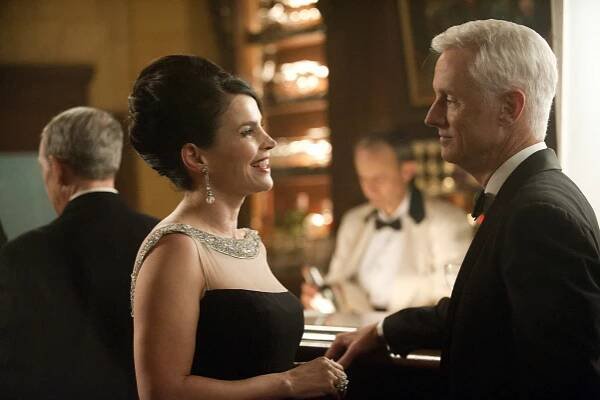 Šílenci z Manhattanu - Z filmu - Embeth Davidtz, John Slattery