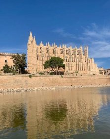 Waterfront view of Palma&rsquo;s spectacular La Seu, a Gothic beauty begun back in the early 14th century. Not all ancient though - Gaud&iacute; worked on renovating the cathedral&rsquo;s interior in the 1900s, and Miquel Barcel&oacute; added a sea-w