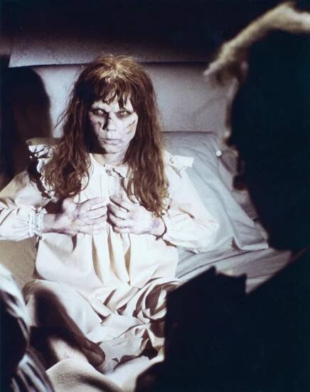 Linda Blair and Swedish actor Max von Sydow on the set of The Exorcist, based on the novel by William Peter Blatty and directed by William Friedkin.