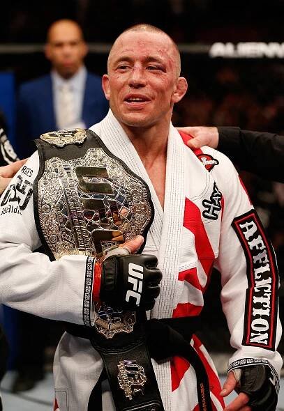 Georges St-Pierre reacts after his victory over Nick Diaz in their welterweight championship bout during the UFC 158 in 2013.