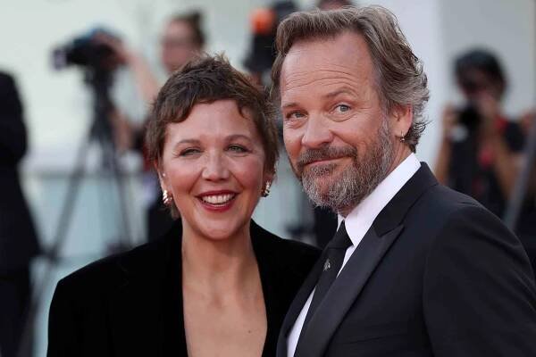 Maggie Gyllenhaal and Peter Sarsgaard on the red carpet ahead of the closing ceremony at the 80th Venice International Film Festival on Sept. 9, 2023, in Venice, Italy
