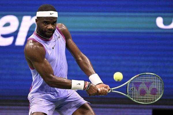 NEW YORK, NEW YORK - SEPTEMBER 01: Frances Tiafoe of USA and Alexei Popyrin of Australia compete during Men's Singles match on Day Seven of the 2024 US Open at USTA Billie Jean King National Tennis Center on September 01, 2024 in New York City