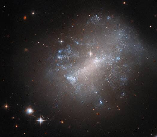 Hubble Captures a Billowing Irregular Galaxy - NASA Science