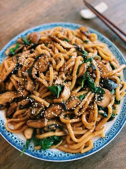 Mushroom Basil Udon Stir Fry garnished with sesame seeds