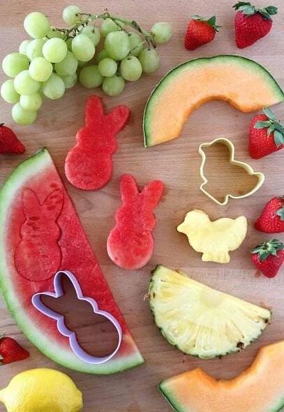 some cut up fruits and vegetables on a table