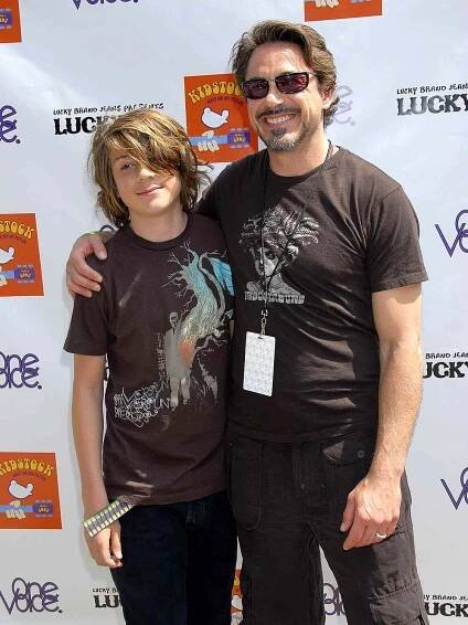 Robert Downey Jr. (R) and son Indio Downey pose at the Kidstock Music and Art Festival at Greystone Mansion June 2, 2007 in Los Angeles, California. 