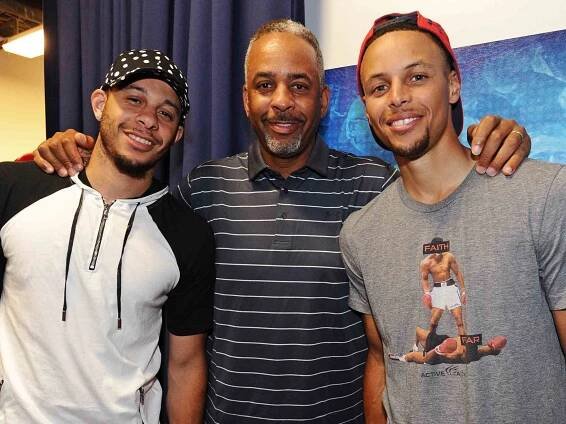Stephen Curry #30 of the Golden State Warriors, Dell Curry, and Seth Curry on July 26, 2016 at ORACLE Arena