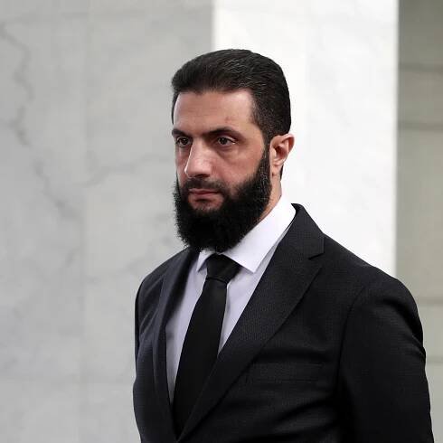 Syria’s Top Rebel Offers Hint of Timetable for Potential Elections