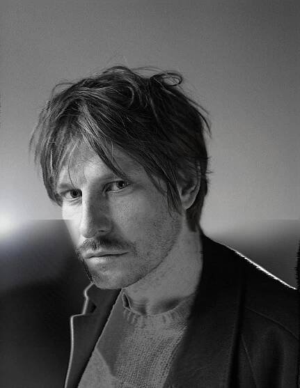 black and white close up of the actor Christoph Gawenda.