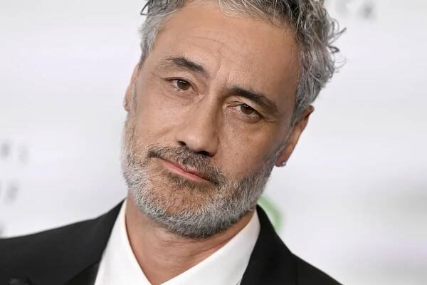 A close-up of Taika Waititi's face in 2025