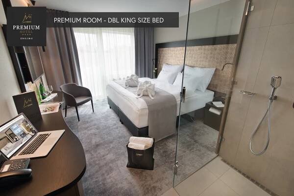 Postel nebo postele na pokoji v ubytování PREMIUM Wellness & Wine Hotel Znojmo