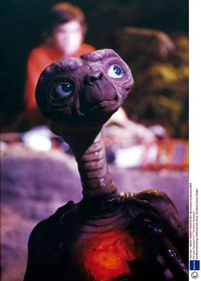 E. T.