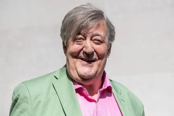 Stephen Fry smiling.