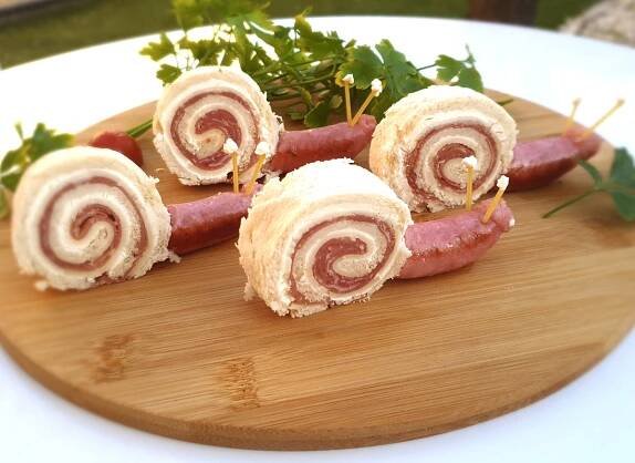 Caracoles de jamón y queso
