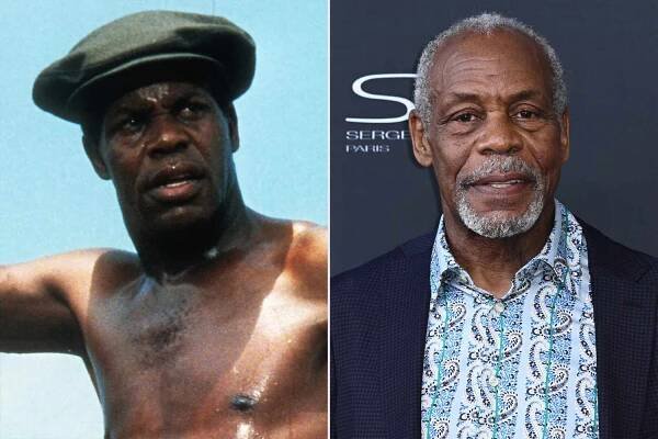 Danny Glover stands while sweating in a scene from the film 'The Color Purple', 1985. (Photo by Warner Brothers/Getty Images); MONTE-CARLO, MONACO - JUNE 17: Danny Glover attends the opening ceremony during the 61st Monte Carlo TV Festival on June 17, 2022 in Monte-Carlo, Monaco. (Photo by Stephane Cardinale - Corbis/Corbis via Getty Images)