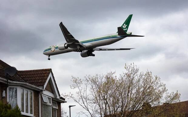 SAUDIA Boeing 777 300ER landing at London Heathrow Airport LHR