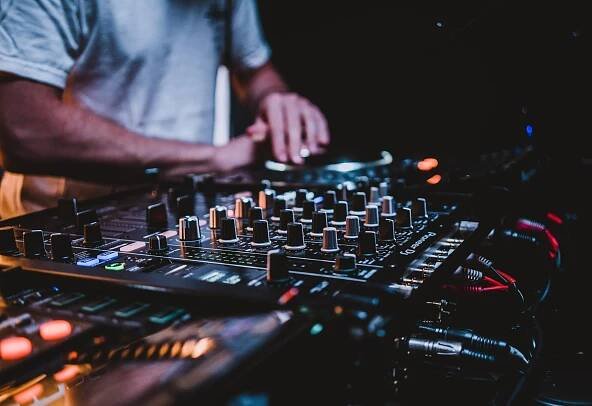 dj mixing on the deck