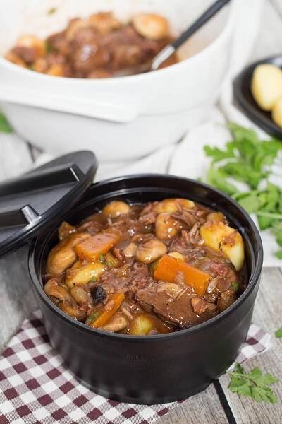 Boeuf Bourguignon is a traditional French beef stew with mushrooms, onions, and other goodies. Try this classic recipe brought by the legendary Julia Child! | cookingtheglobe.com