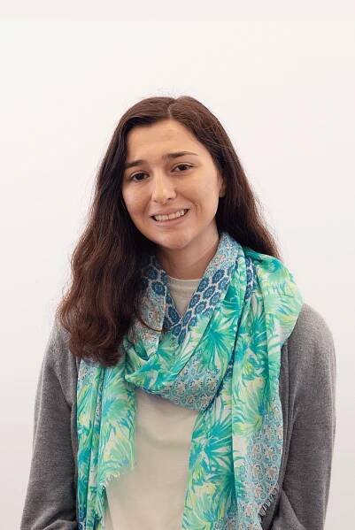 A headshot of the designer
