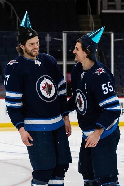 Winnipeg Jets hockey players laughing Adam Lowry Mark Scheifele