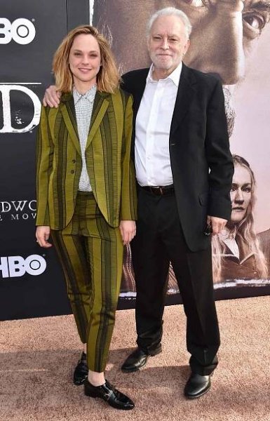 US actor Brad Dourif (R) and his daughter actress Fiona Dourif arrive for the Los Angeles premiere of HBO Films "Deadwood" at the Cinerama Dome in Hollywood on May 14, 2019.