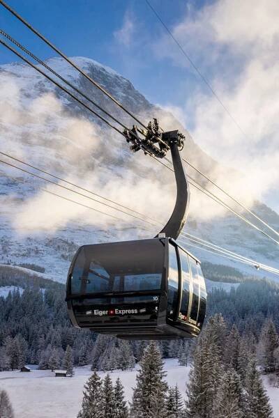 The Eiger Express 3S Cable Car connects Grindelwald and the Eiger Glacier station, Eiger north face in background