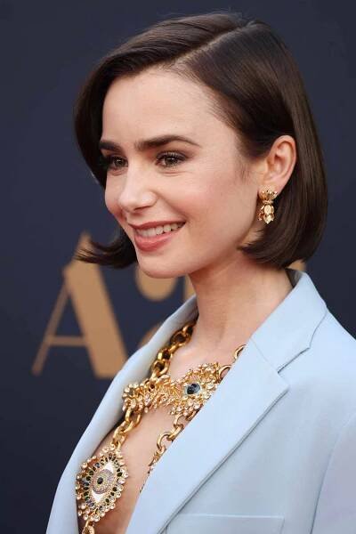 Lily Collins Just Chopped Off All of Her Hair Herself For Summer for Maxxxine world premiere on June 24.