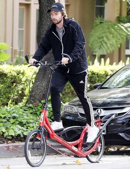 Patrick Schwarzenegger and Abby Champion ride bikes with Maria Shriver