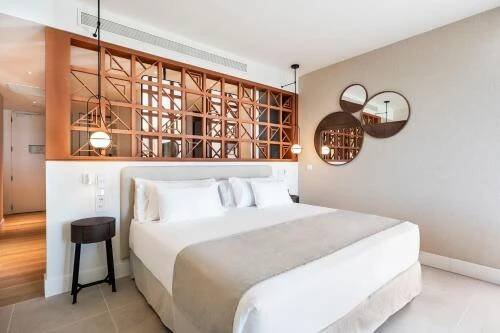 Postel nebo postele na pokoji v ubytování Barceló Playa Blanca