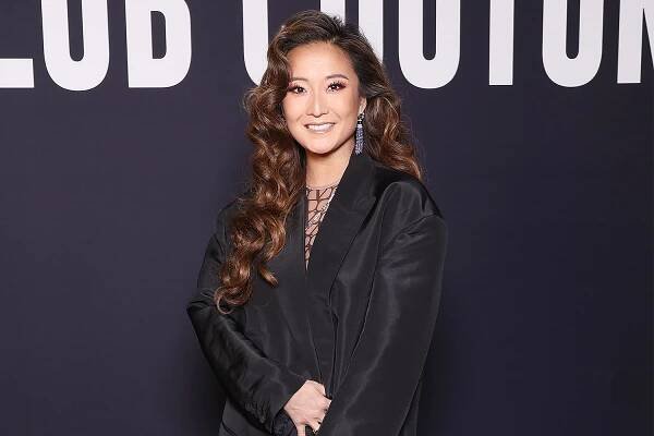 Watch Ashley Park Tackle Paris Fashion Week with an Ankle Brace, Crutches — and High Heels!
