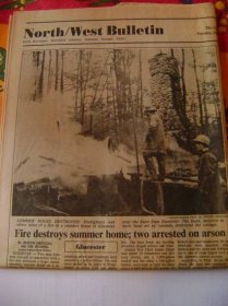 Providence Journal newspaper article with photographs of Chet Worthington's cottage.  The smoking remains were all that was left after two local teenagers burned it down.