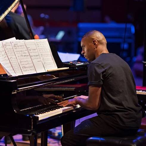 David Austing Grey playing the piano