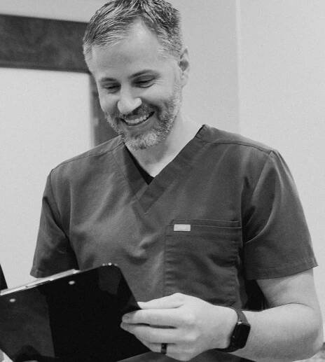 A black and white image of dr. david gay