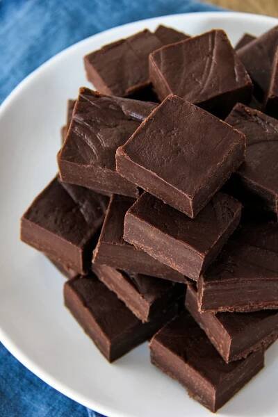 a stack of squares of fudge on a plate | Homemade fudge recipes, Fudge recipes, Homemade fudge