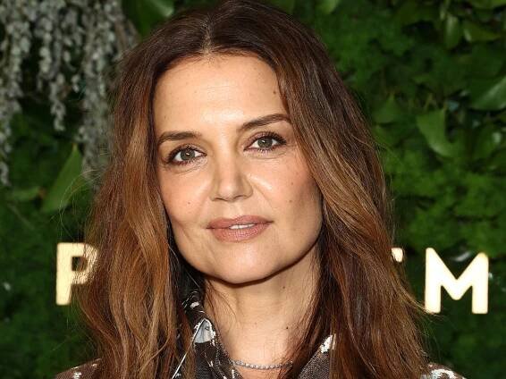 Katie Holmes steals the show with slick hair updo and semi-sheer top during NYC outing